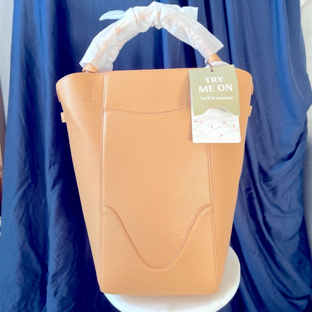 Oleada  bucket handbag. Great condition with tags and original wrapping.